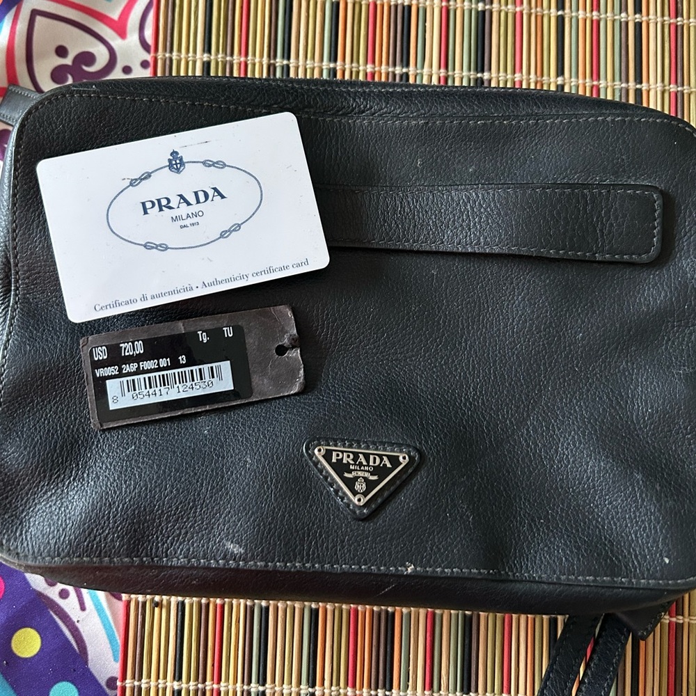Prada organizer-black leather. Perfect for the busy person to stay organized.